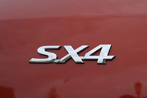 Сузуки SX4 значок